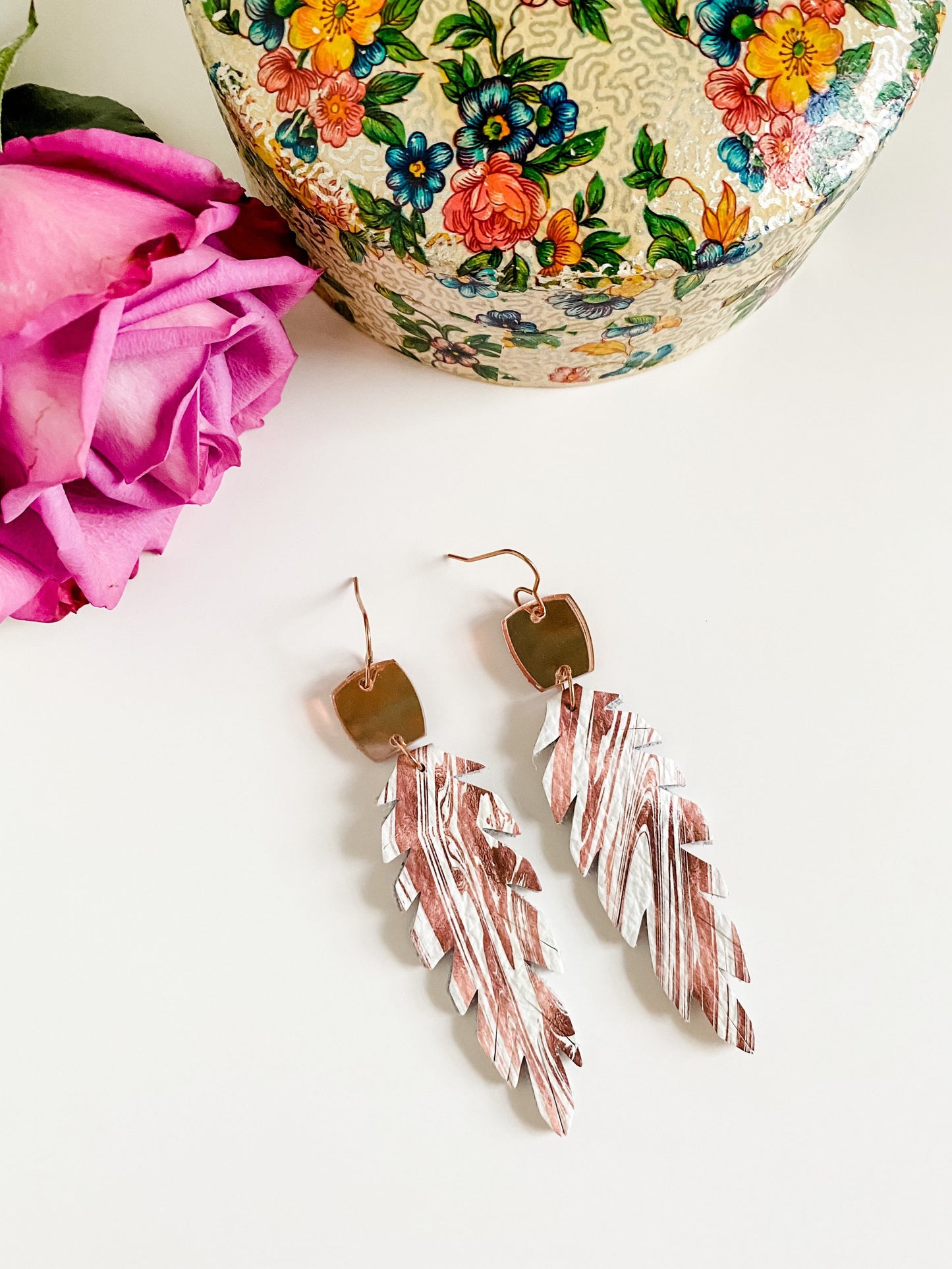 Double Sided Feather Earrings with Mirrored Rose Gold Connectors, Root Beer Swirl on White Leather, Boho Feather Earrings, Medium Length