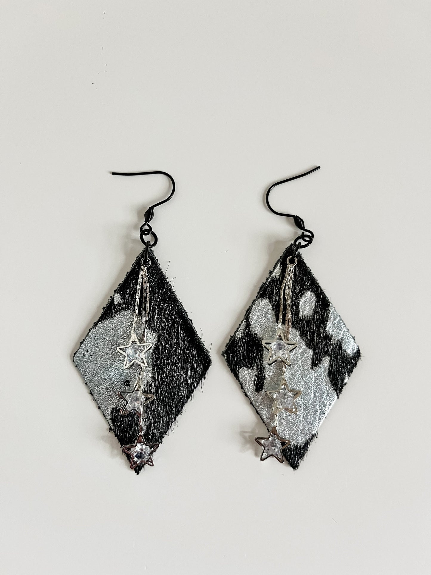 Black and Silver Cowhide Earrings with Star Chain Tassel Dangles, Western Glam Earrings, Festival Earrings, Concert Earrings, Hair on Hide