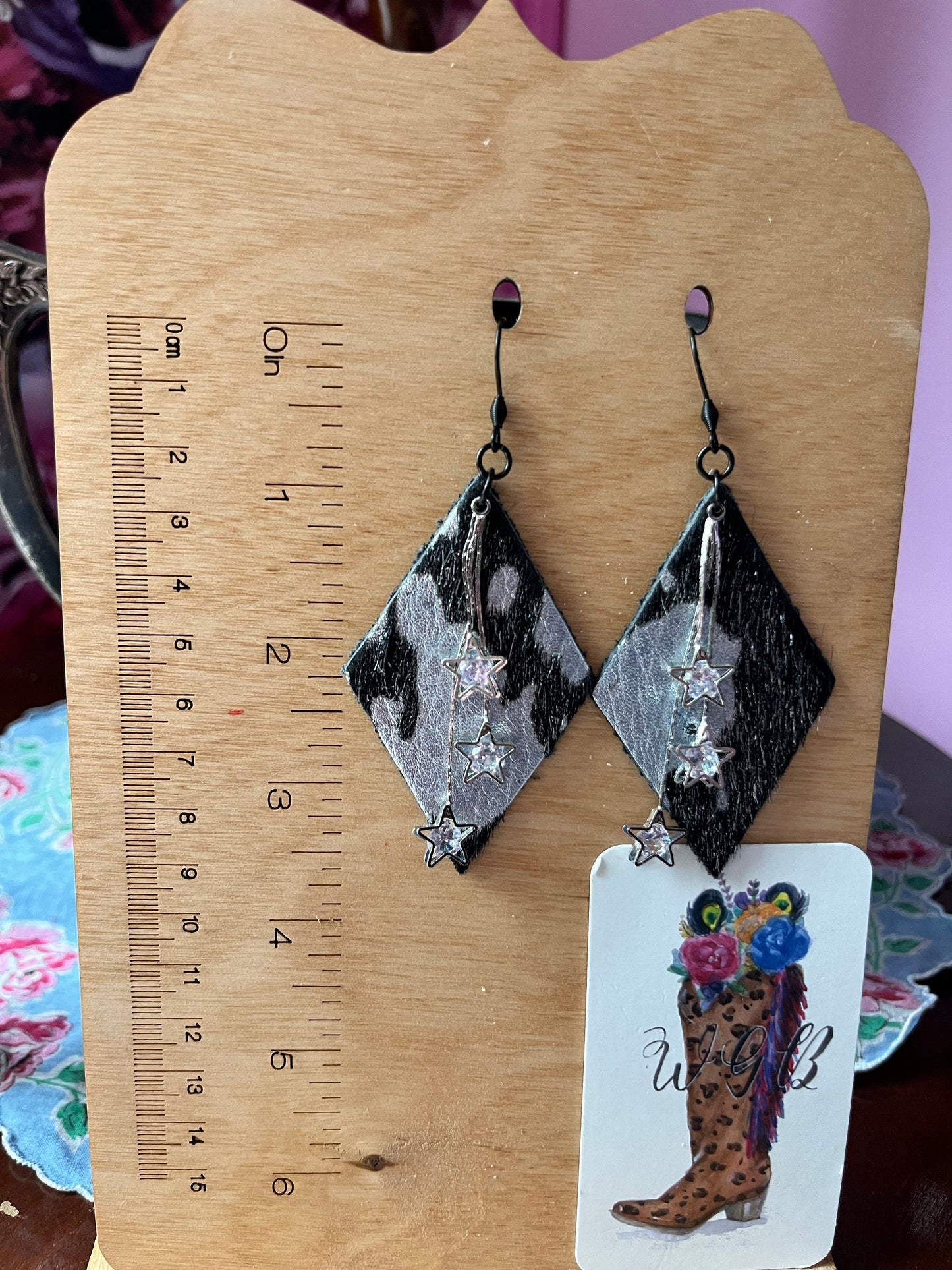 Black and Silver Cowhide Earrings with Star Chain Tassel Dangles, Western Glam Earrings, Festival Earrings, Concert Earrings, Hair on Hide